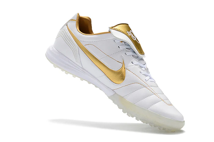 Chuteira Nike Retro Tiempo Legend 7 Elite TF Branco e Gold Society